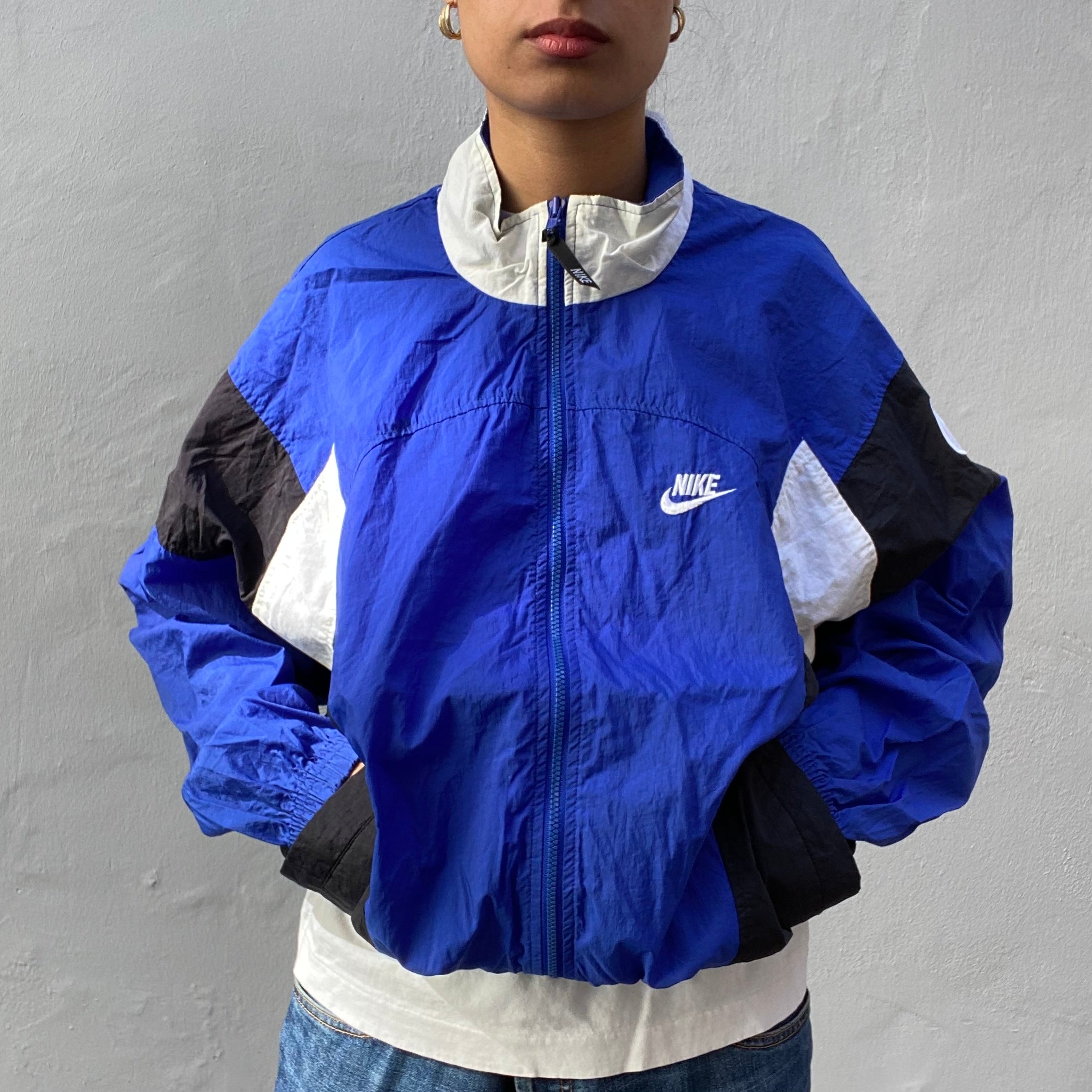 Blue and white nike windbreaker online