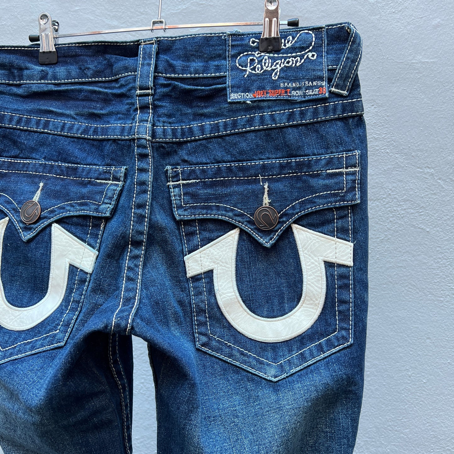 True Religion Flared Pants back pocket