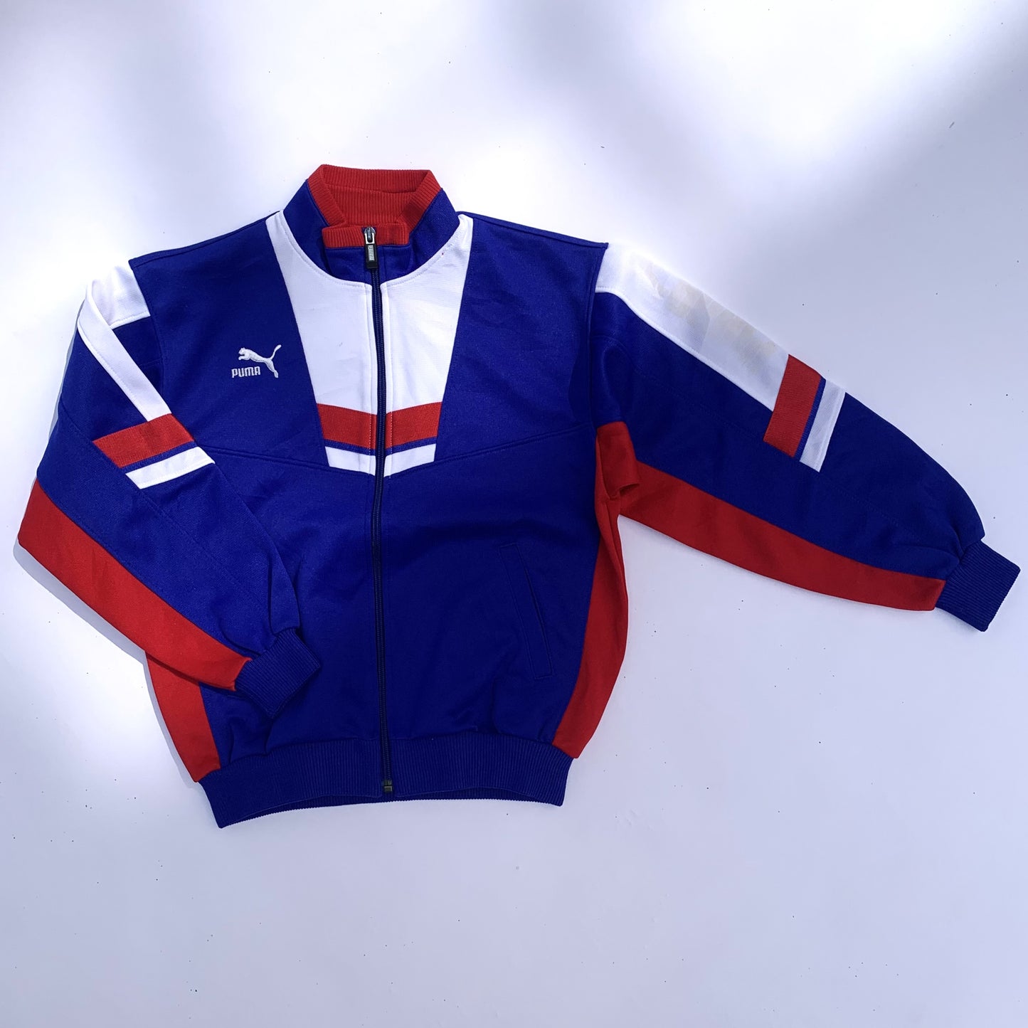 Red and Blue Puma Track Suit