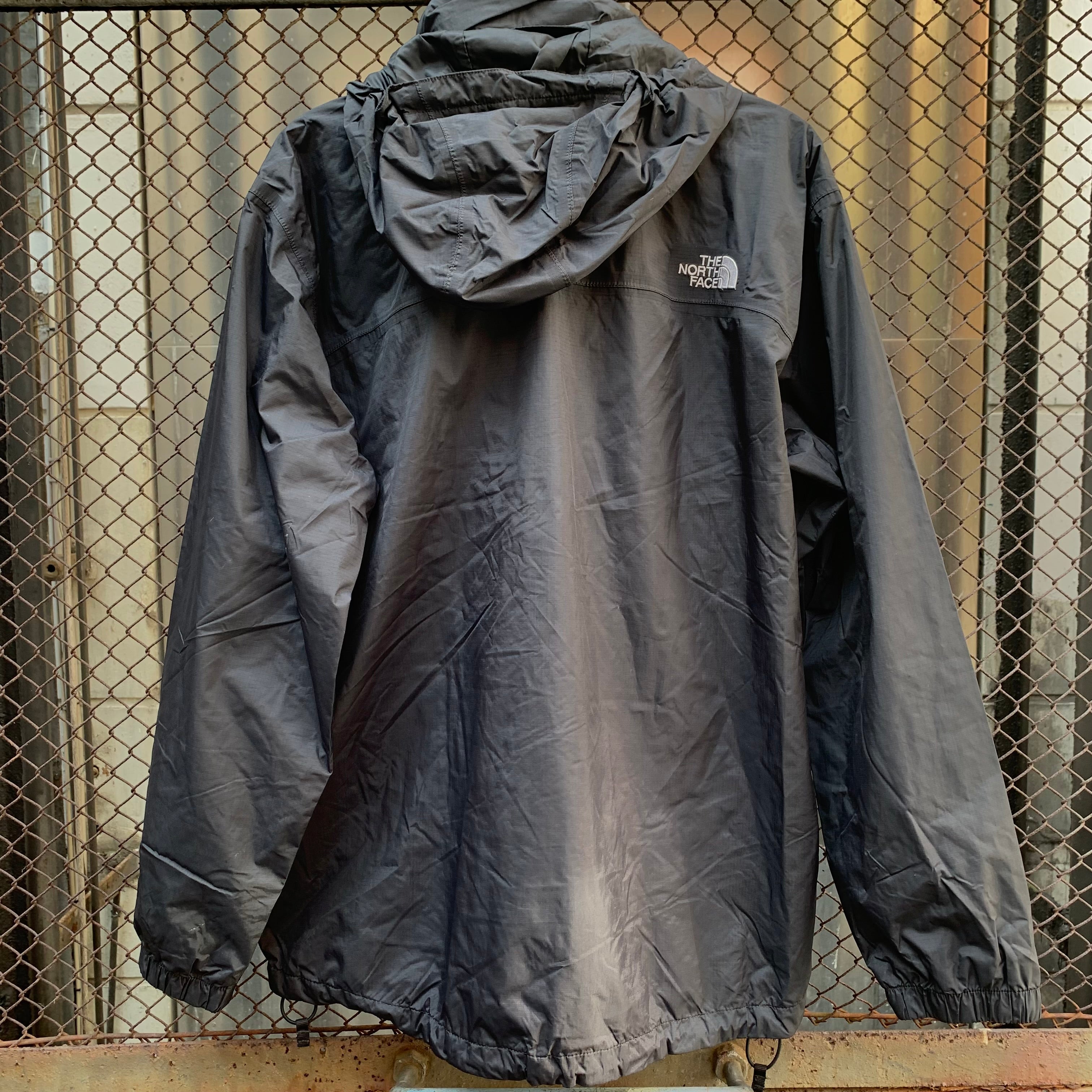 All black north face on sale windbreaker